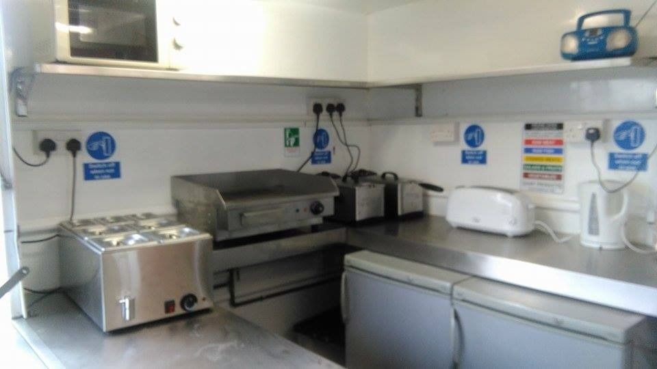 Inside small Burger catering trailer